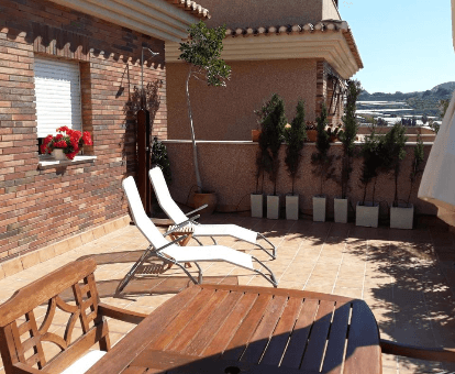 Terraza y Playa Costa Tropical